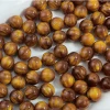 Chinese-style handcrafted beaded imitation wood, gilded silk nanmu, imitation cat's eye, silver-coated resin loose beaded accessories details Picture